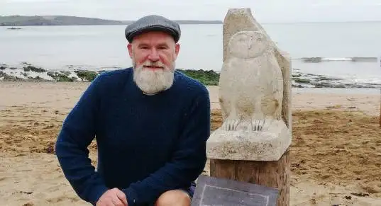 Marc and stone carving of owl